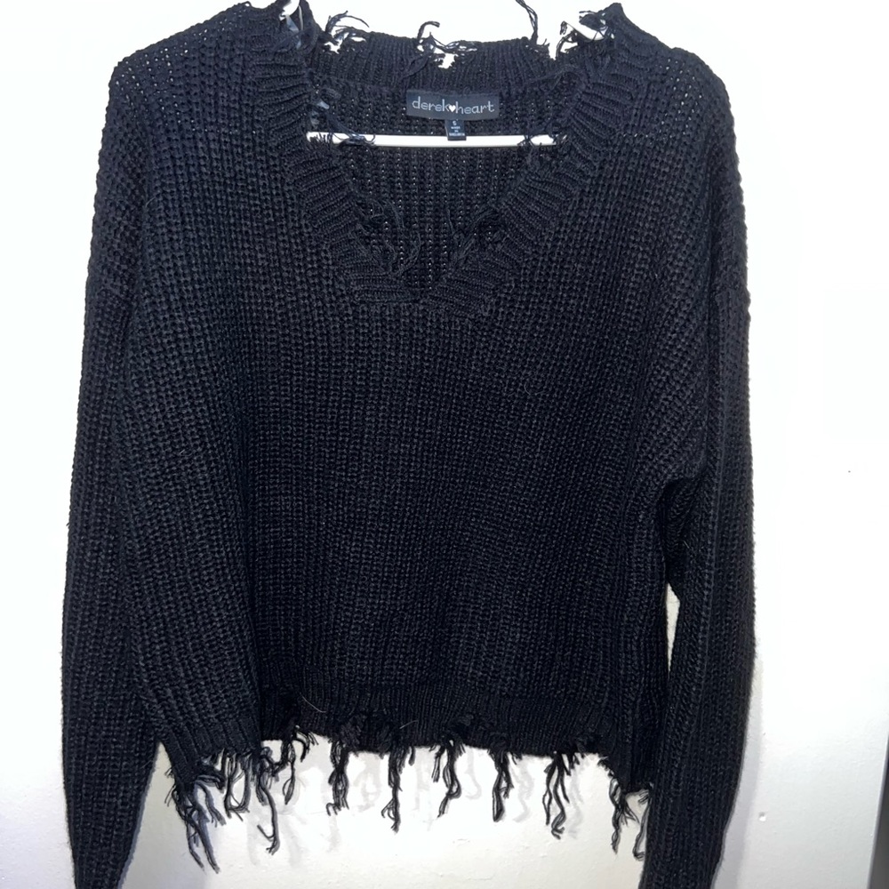 Ripped styled sweater